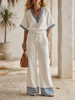 Off-white And Navy Blue Multi-striped Trim V-neck Elbow-sleeve High-waisted Wide-leg Cotton-linen Jumpsuit With Drawstring Waist.
